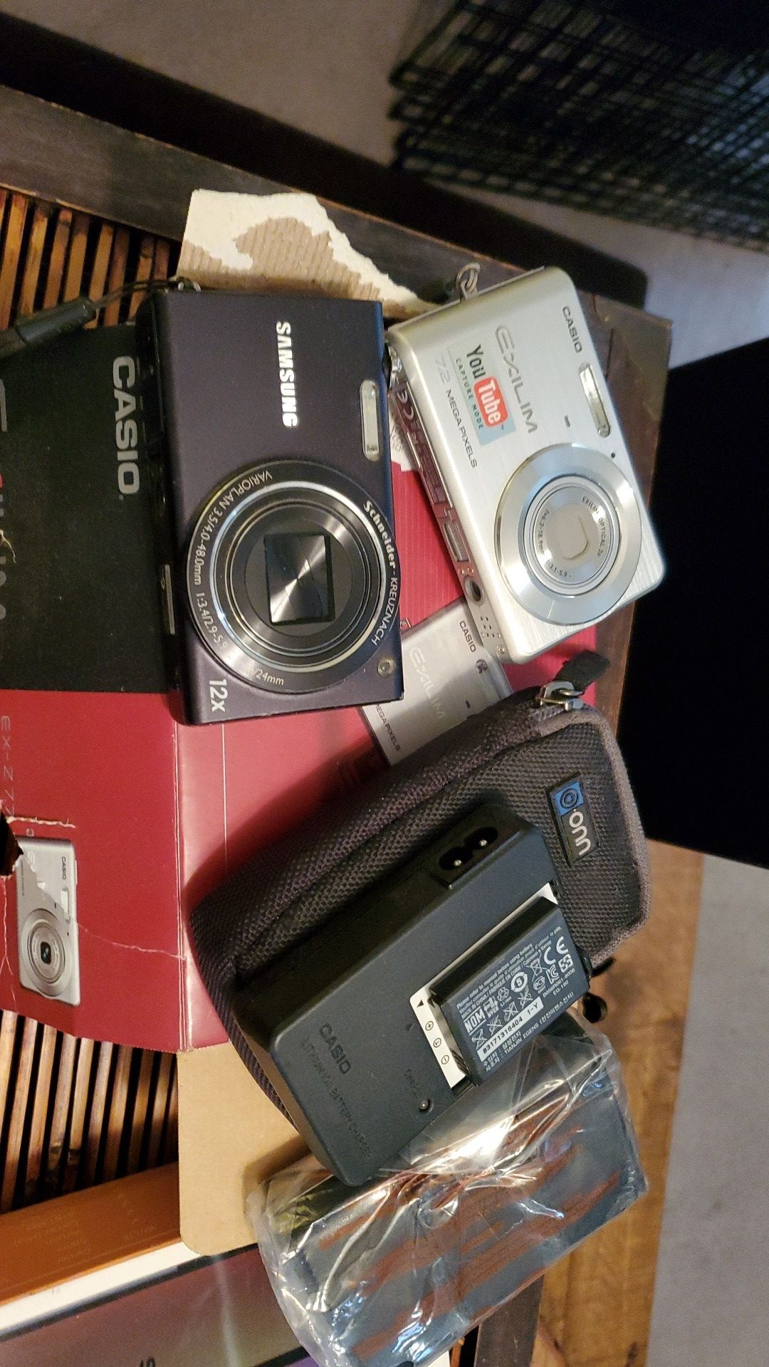 Very nice digital cameras with batteries cases one even has the Box both of them the very nice and work