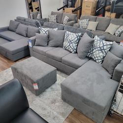 New 2pc Sectional Plus Ottoman In Grey 