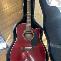 Takamine EG530C acoustic-electric guitar in a red finish