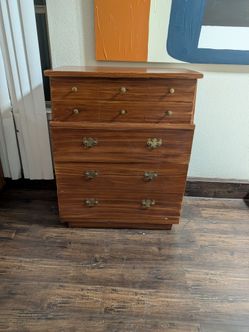 Vintage WOoden chest-on-chest dresser featuring a