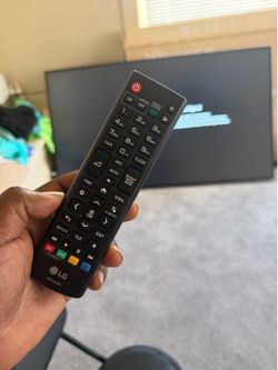 75 inch TLC tv -remote and wall mount . Like new
