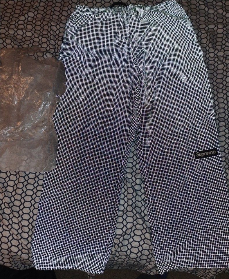 Supreme Reflective Ripstop track pants
XL