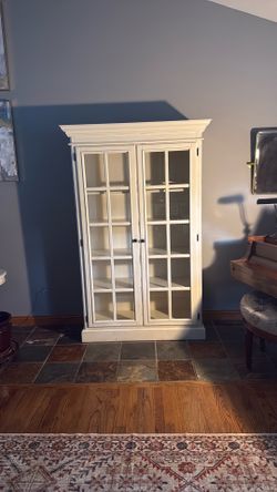 Tall curio cabinet