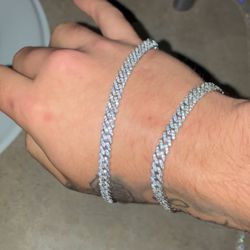 Two Cuban link bracelets