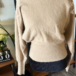 Women’s sweaters and shirts