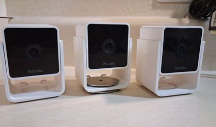 Petcube Cam (Model CC10US) indoor Wi-Fi pet and security cameras.