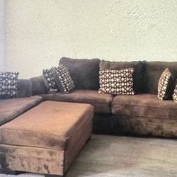 Brown couch and Chase/ w ottoman