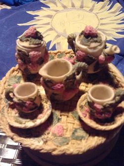 Very small tea set. Decorative.