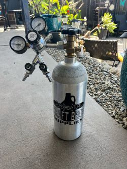 Co2 bottle and two keg taps l