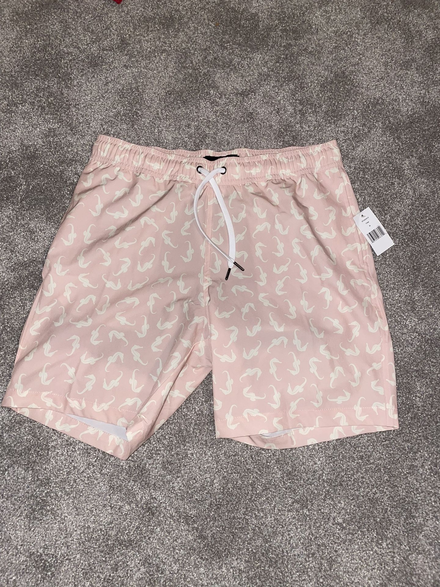 Pink swimming trunks