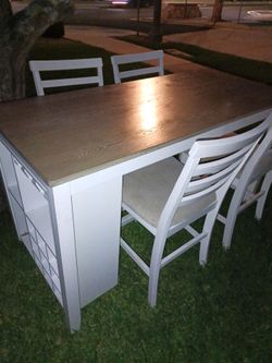 Table and 4 chairs.