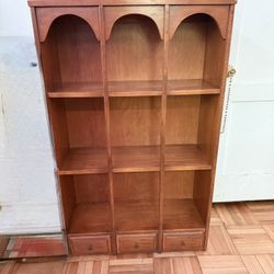 vintage wooden shelving unit