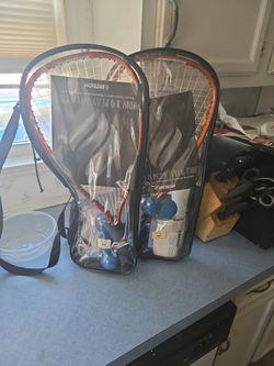 2 racquetball, rackets, or possibly pickleball. Rackets, you get 'em both for thirty bucks