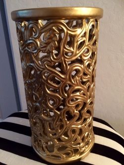 Gold vase candle holder