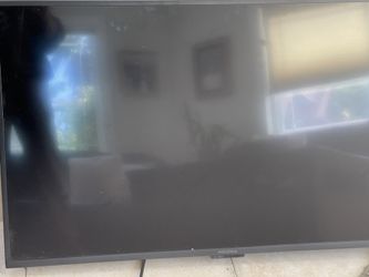 Insignia 43” Tv With Wooden Base With Wheels & White Stand , Looking Very Elegant