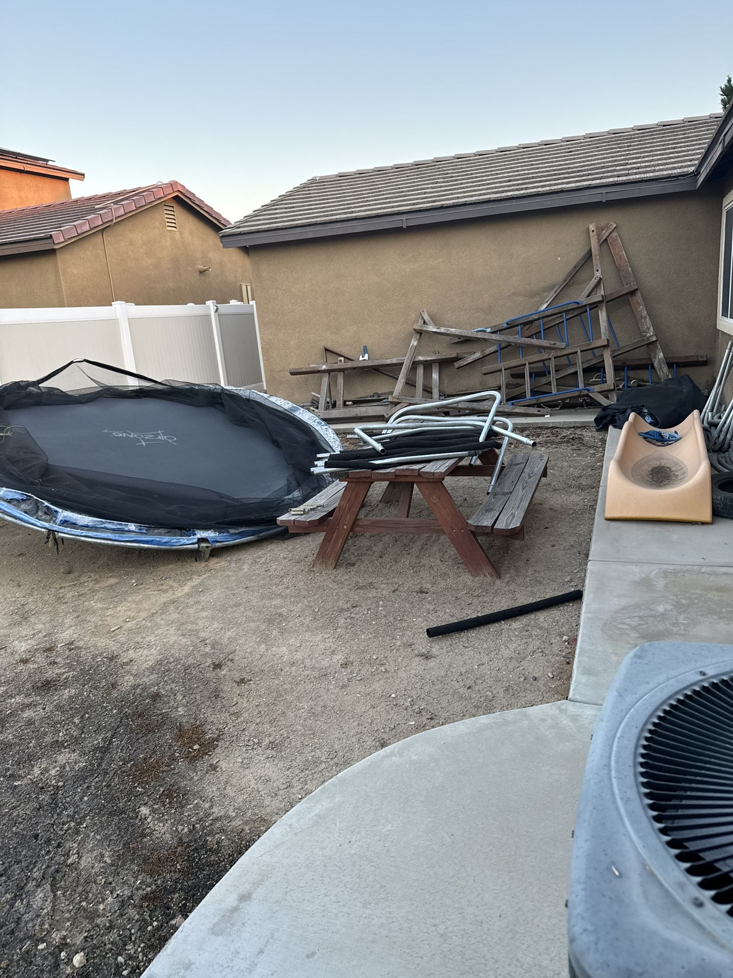 Free 2 trampolines 1 old swing set 1 wooden bench