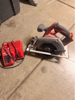Milwaukee skil saw & charger
