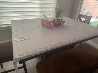 Dining table with four chairs