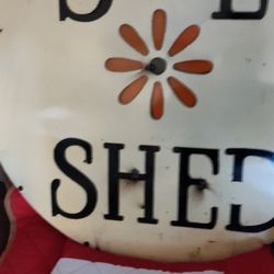 Previously Owned Metal Round Sign 