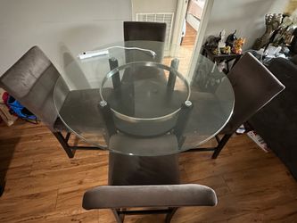 Used Glass Top Dinning Table With 4 chairs