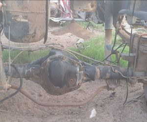 Rear Axle + Suspension + Wheels
1999 Dodge Ram 2500 Dana 60 Rear Axle Assembly with Leaf Springs, Drums & Wheels – $650 OBO