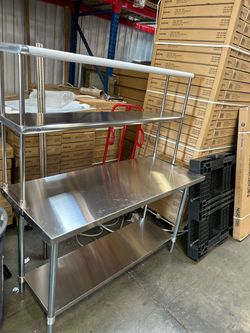 Brand new stainless steel work tables for commercial use kitchen warehouses restaurants and workshops