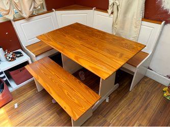 Kitchen nook with table and bench