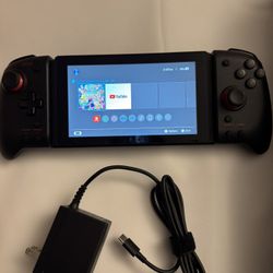 Nintendo Switch w/ Super Smash Bros Game 