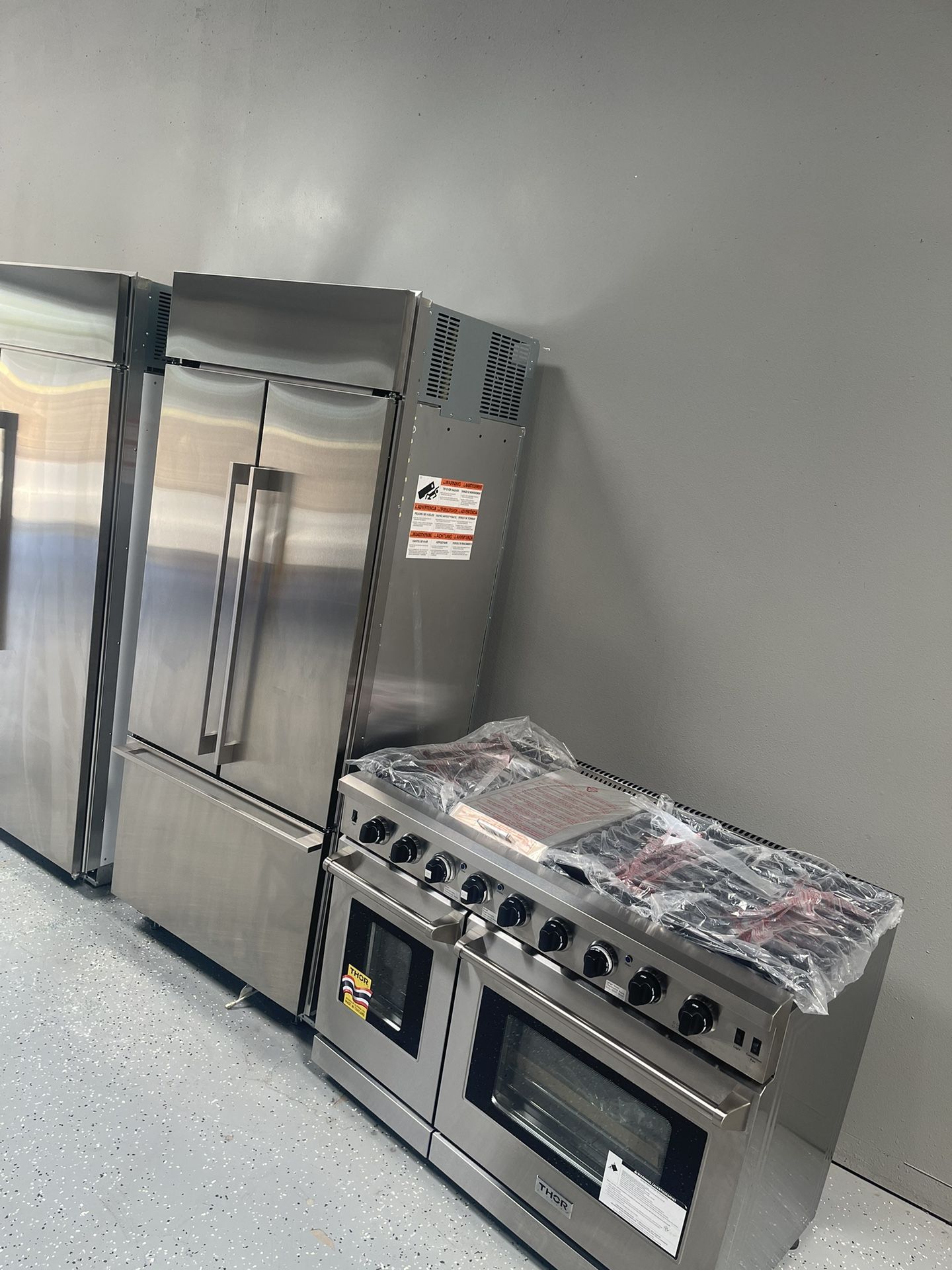 Monogram 36’ built In refrigerator -Thor 48’ Gas Stove