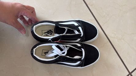 Black vans with tag