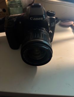 Canon EOS 70d with 2 lenses,2 batteries, and charger