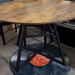 Table & 4 black chairs