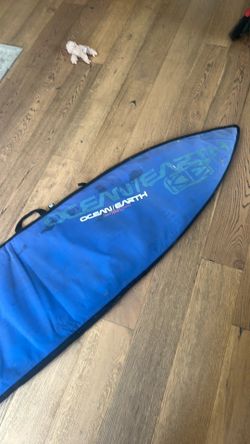 Surfboard, travel bag