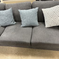 Gray Sofa With Pillows 