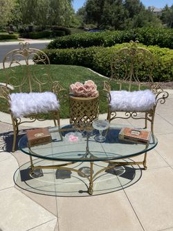 Two Gold Metal Royalty Chairs With Plush White Cushion