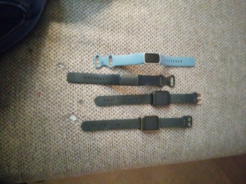 Fusion Tech 2 Smart Watches And 2 Fitbits