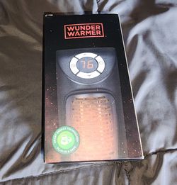 Wunder Warmer plug-in small personal space heater. new open box.... tested and they work well