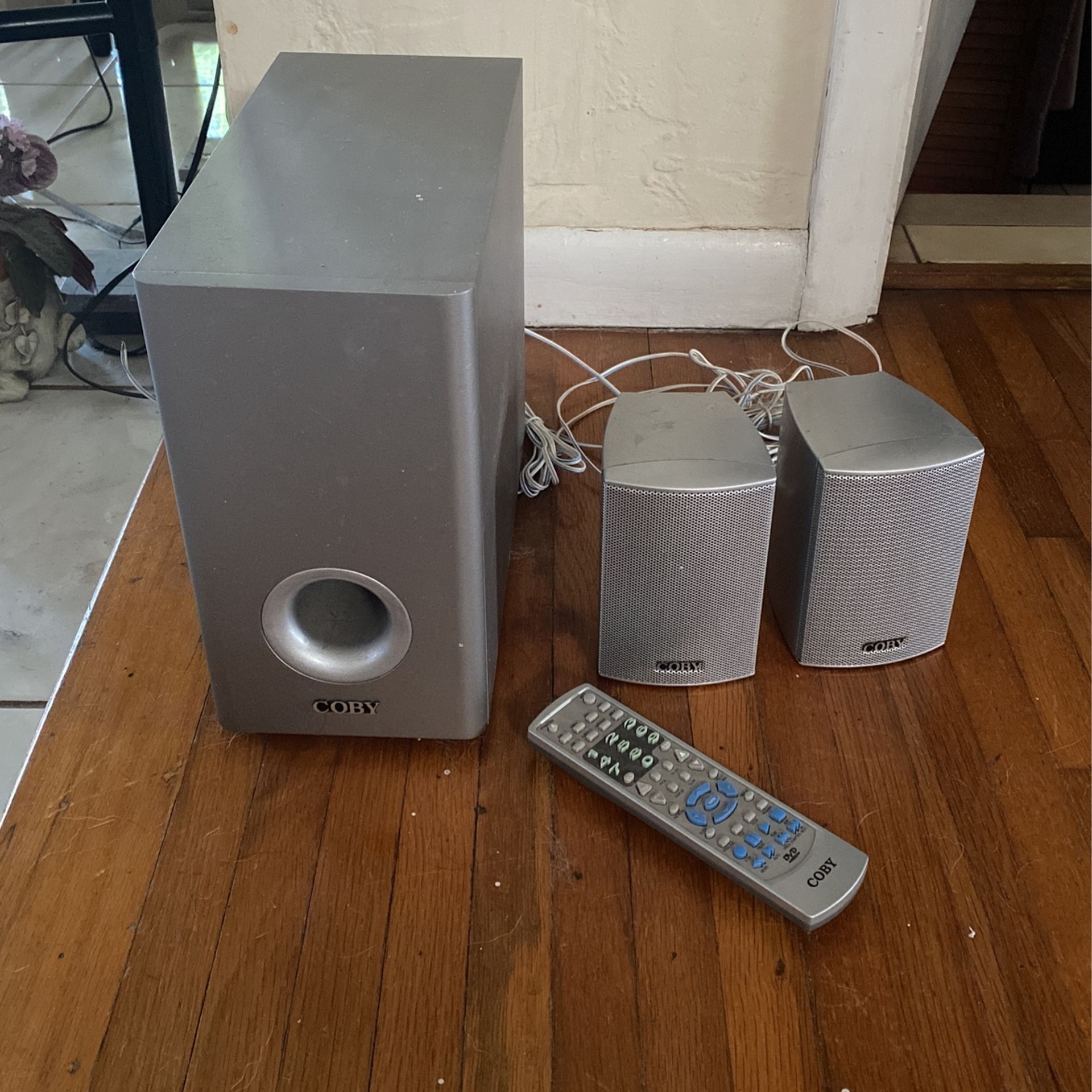 Coby Surround Sound With Subwoofer And Two Speakers And Remote Control. Unboxed And Never Used.