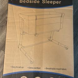 New in box bassinet bedside sleeper