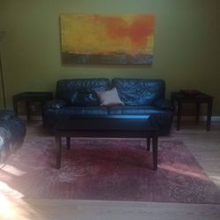 3 Soft Real Leather Couches, 2 End Tables, 1 Coffee Table, 1 Red Hand Made 5*8 Rug