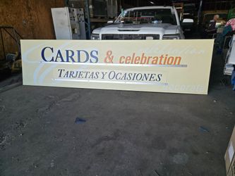 Giant "Cards and Celebration" sign