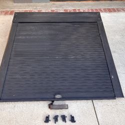 Retractible Tonneau Cover (hard) by Truck Covers USA.
