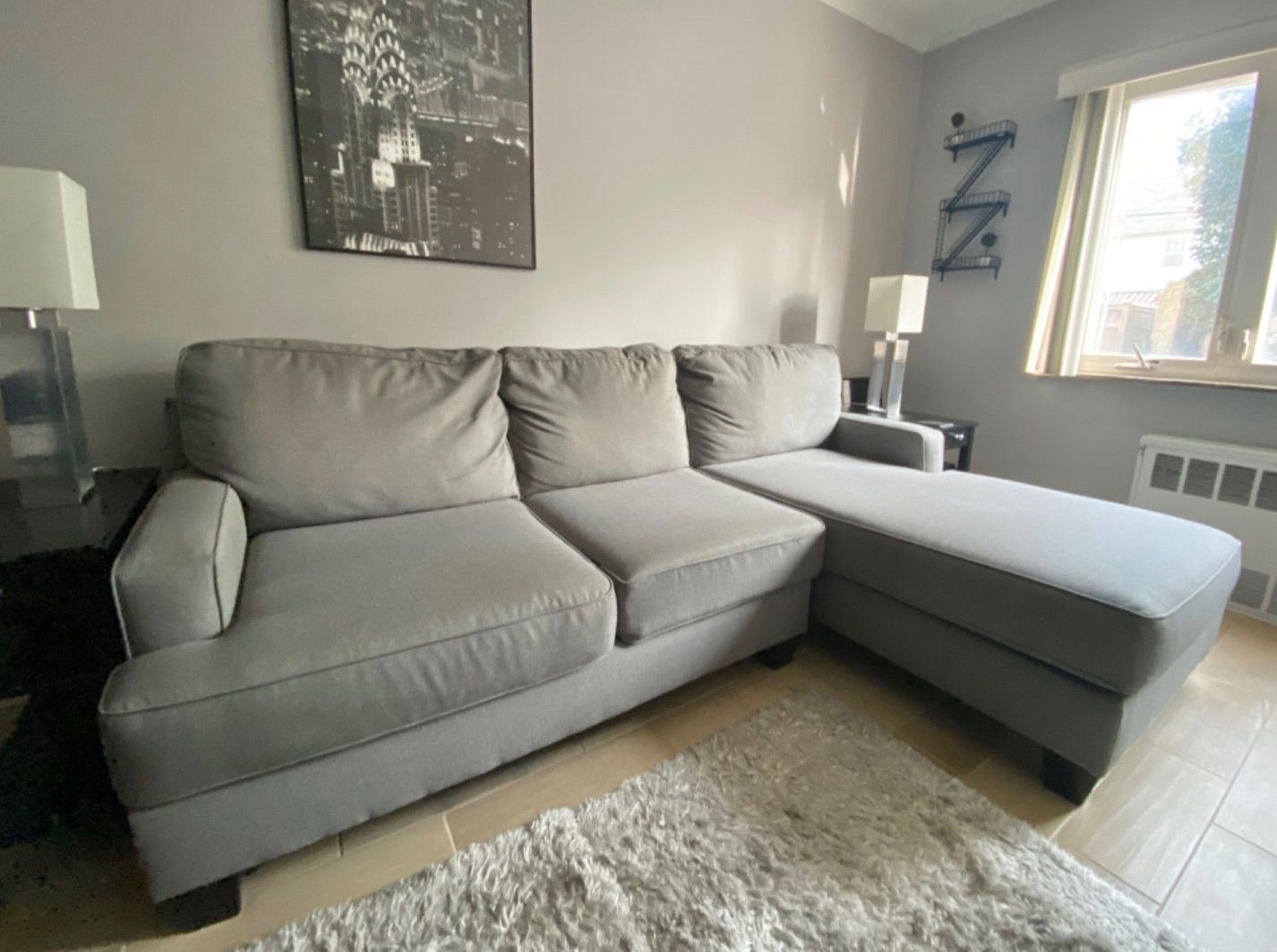 Light Gray Ashley HomeStores Sectional Sofa with Rightside Chaise