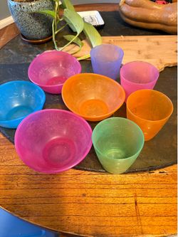 Munchkin plastic bowls and cups set