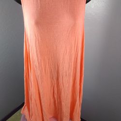 Dainty Hooligan Small peach long shirt 
97% rayon and 3% spandex
