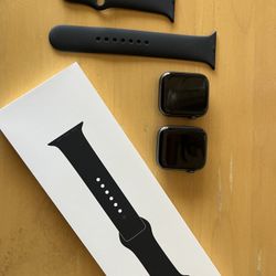 A Pair Of Apple Watch Series 5 44mm Aluminum & Ceramic  Case Sports Band