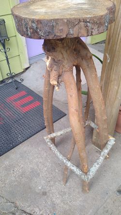 Handcrafted stool for exterior plant or garden areas