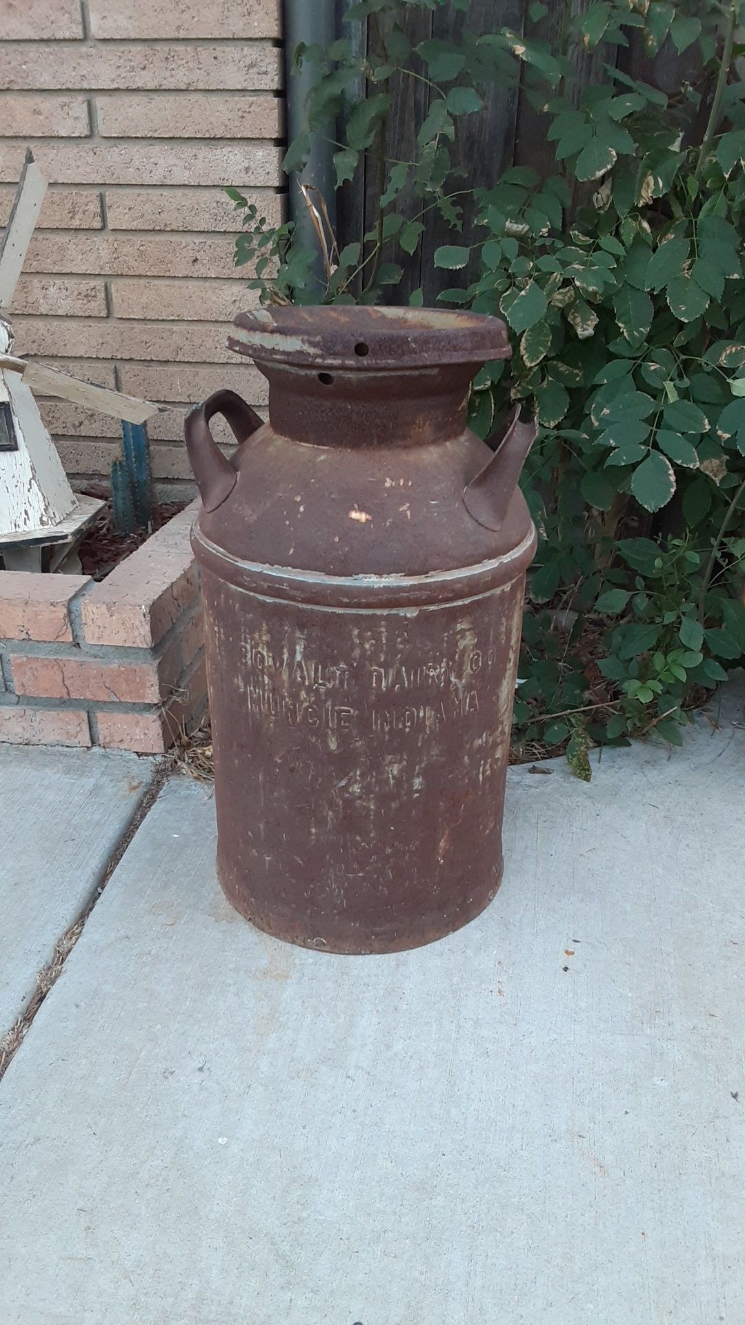 Vintage metal milk container