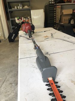 Toro power head with hedge trimming attachment