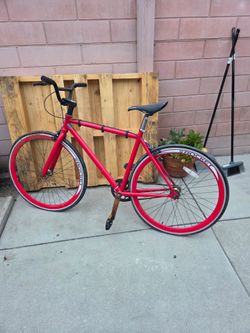 Red bicycle it says rocket on the rims